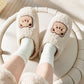 Chausson ours porté aux pieds