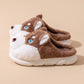 Chaussons chien husky, vue de côté