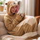 Combinaison pyjama loutre portée sur le canapé