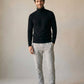 Pull col roulé doublé polaire homme noir, vue en pied