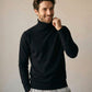 Pull col roulé doublé polaire homme noir, porté au quotidien