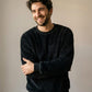 Pull pilou pilou cocooning homme noir, porté au quotidien