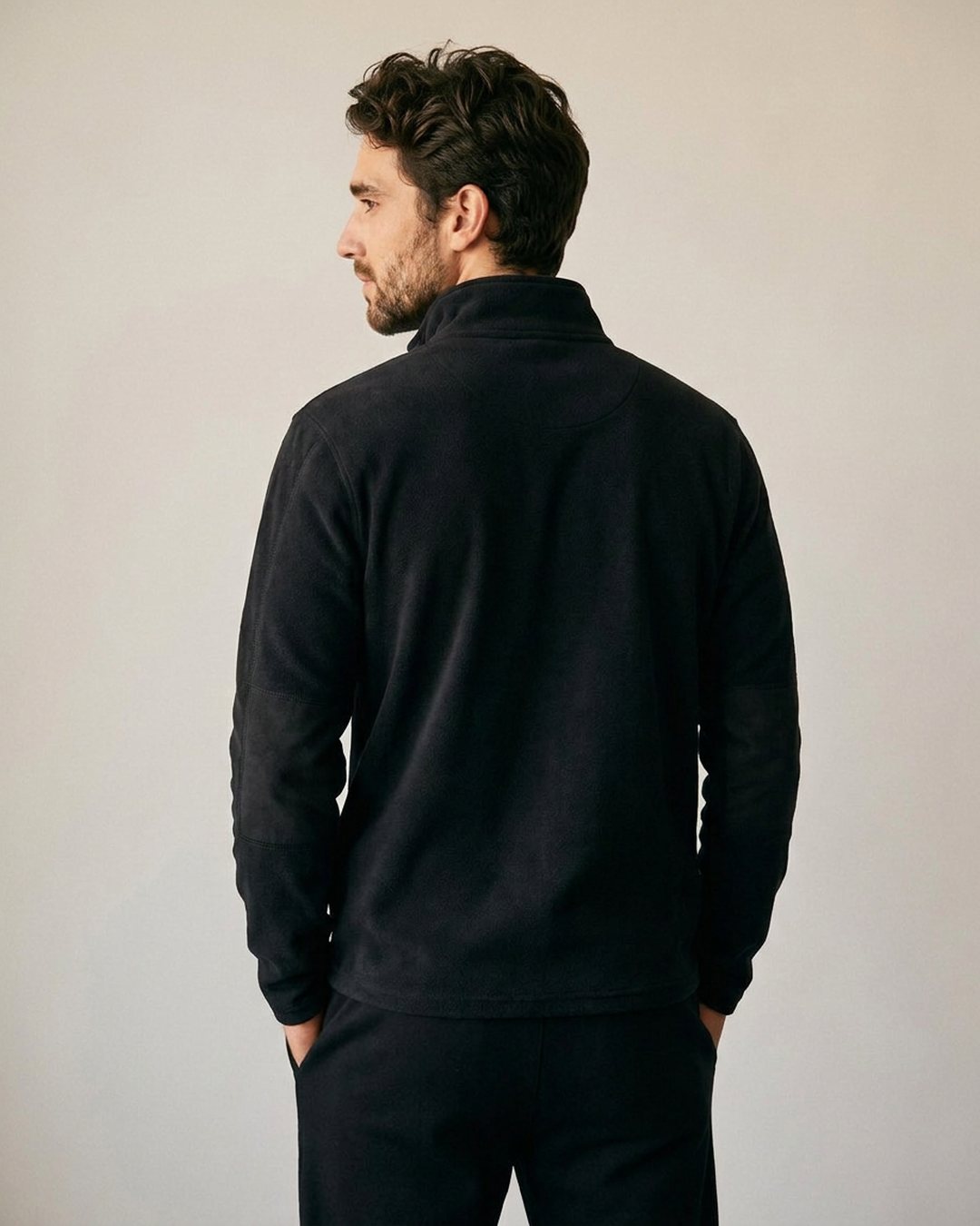 Pull polaire homme col montant demi-zip noir, vue de dos