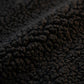 Détail de la polaire sherpa noire du sweat à capuche